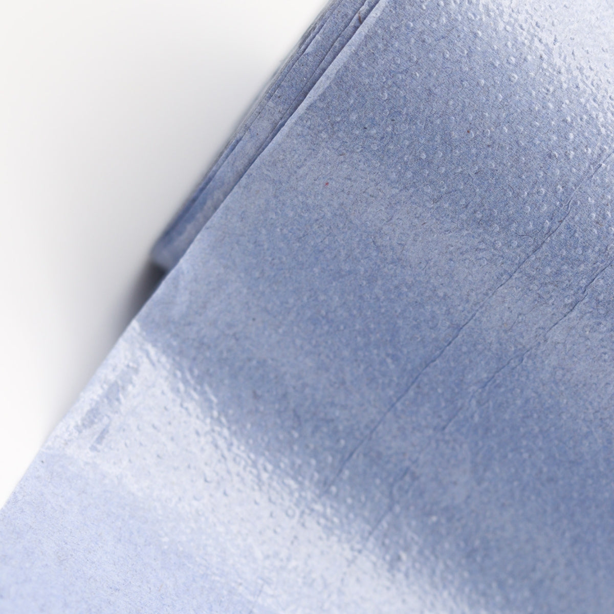 Draps d'examen en ouate bleue plastifiée 36 g/m²