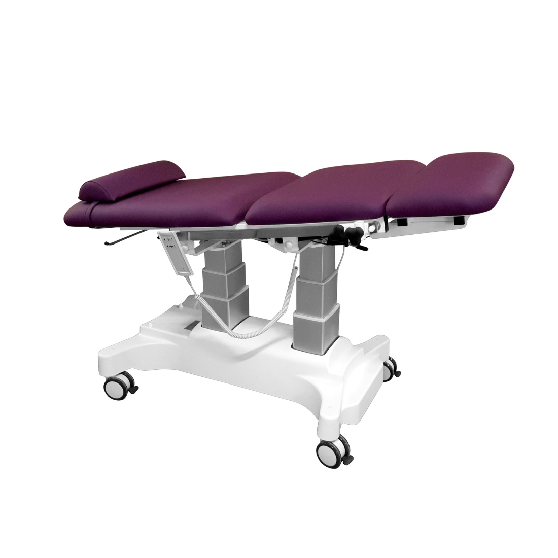 Fauteuil d’examen électrique en Trendelenburg, hauteur 620–1020 mm, sellerie plate, étriers inox et porte-rouleau
